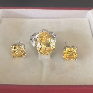 Nicole Miller Asscher set in gold travel set.